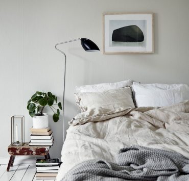 Beige swedish bedroom interior