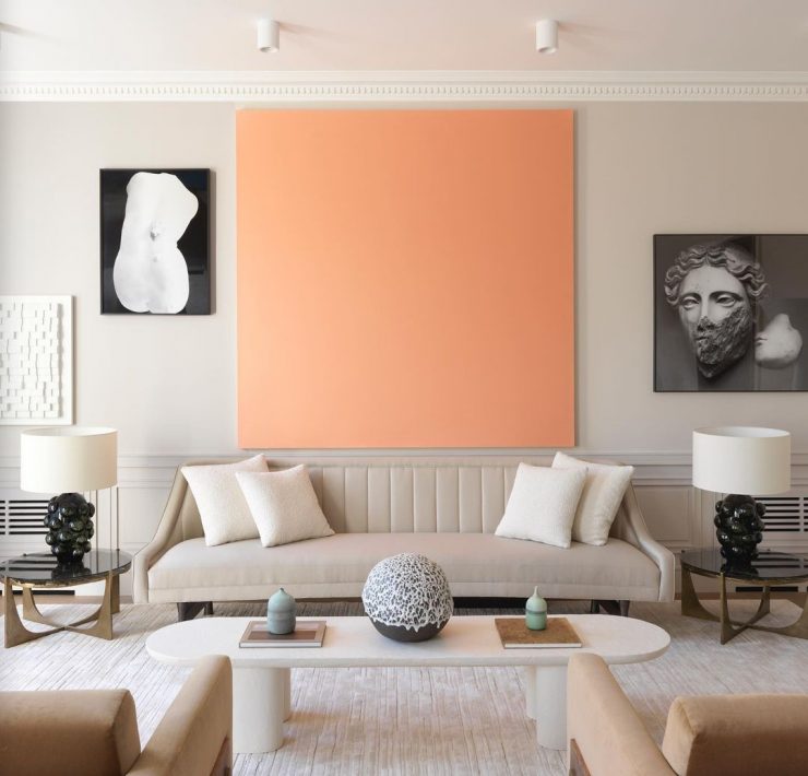 Apricot living room design with art in focus