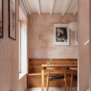 Light pink kitchen walls with warm woods