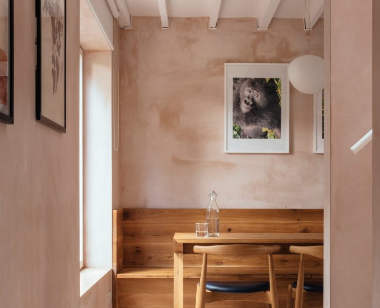 Light pink kitchen walls with warm woods